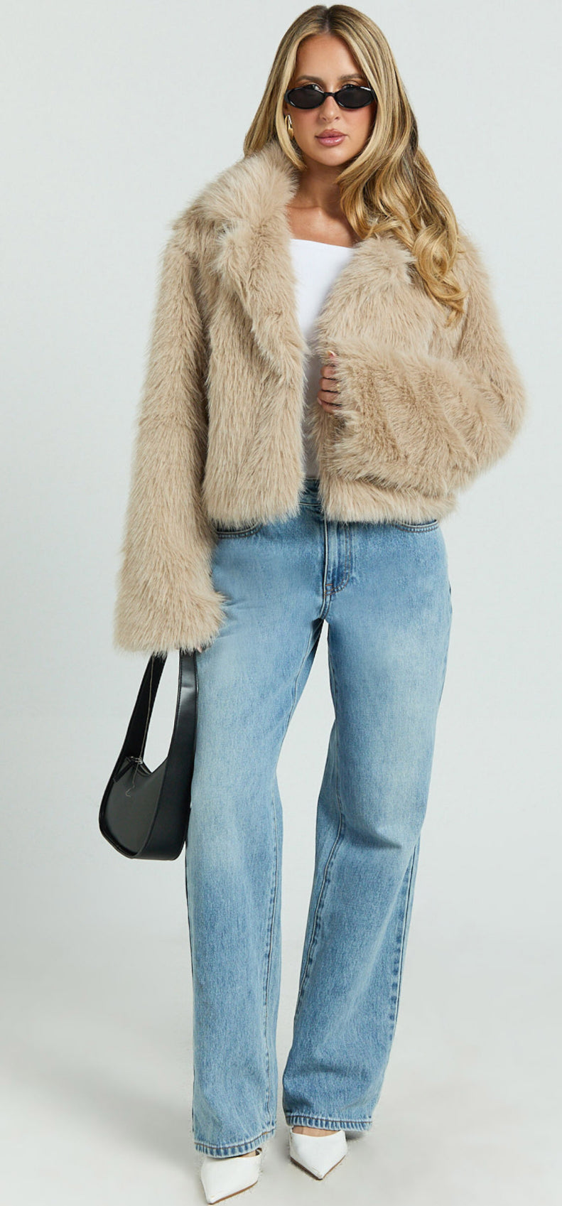 ‘Rania’ beige faux fur coat